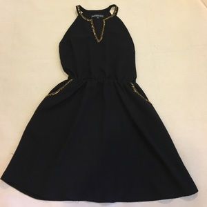 Black Briton Ivy dress with gold accents