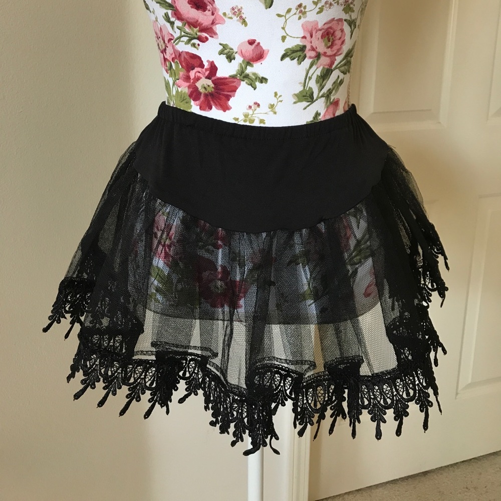 Petticoat Tutu with lace trim. One size fits most.