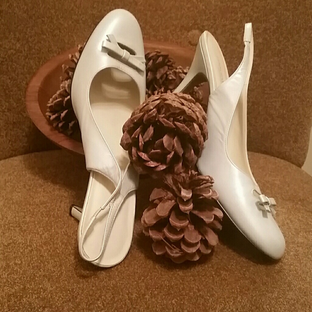 Silvery/powder blue slingback. Bow.