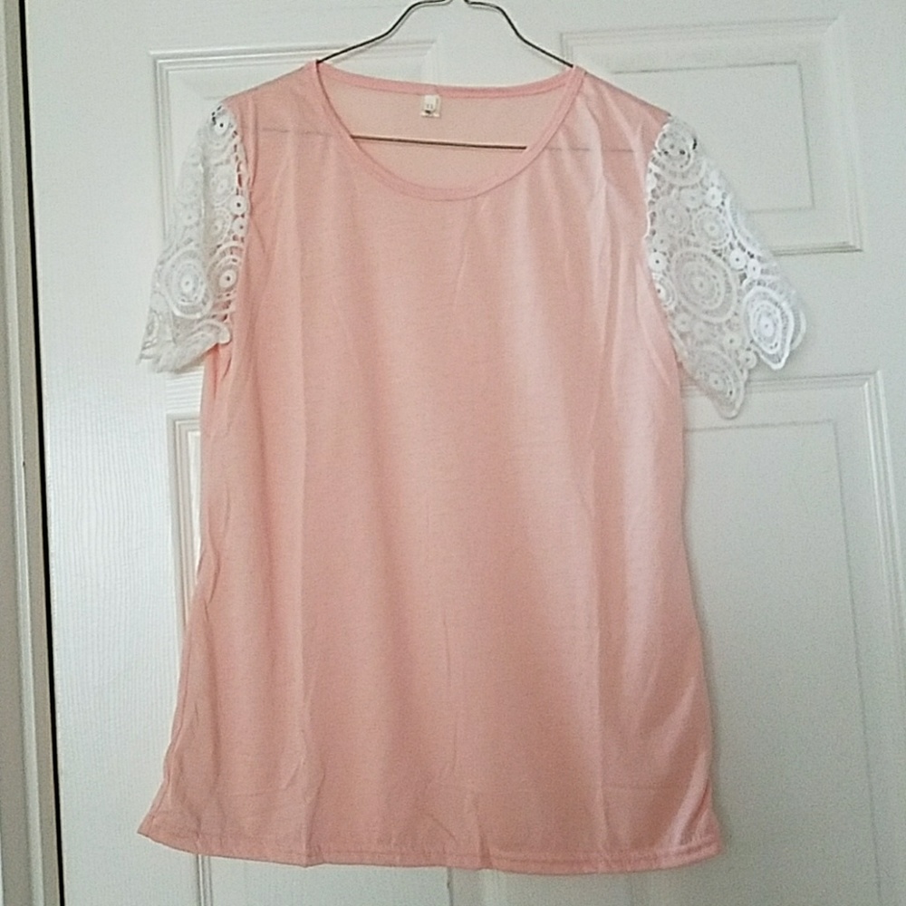 Women's light pink top with crochet short sleeves