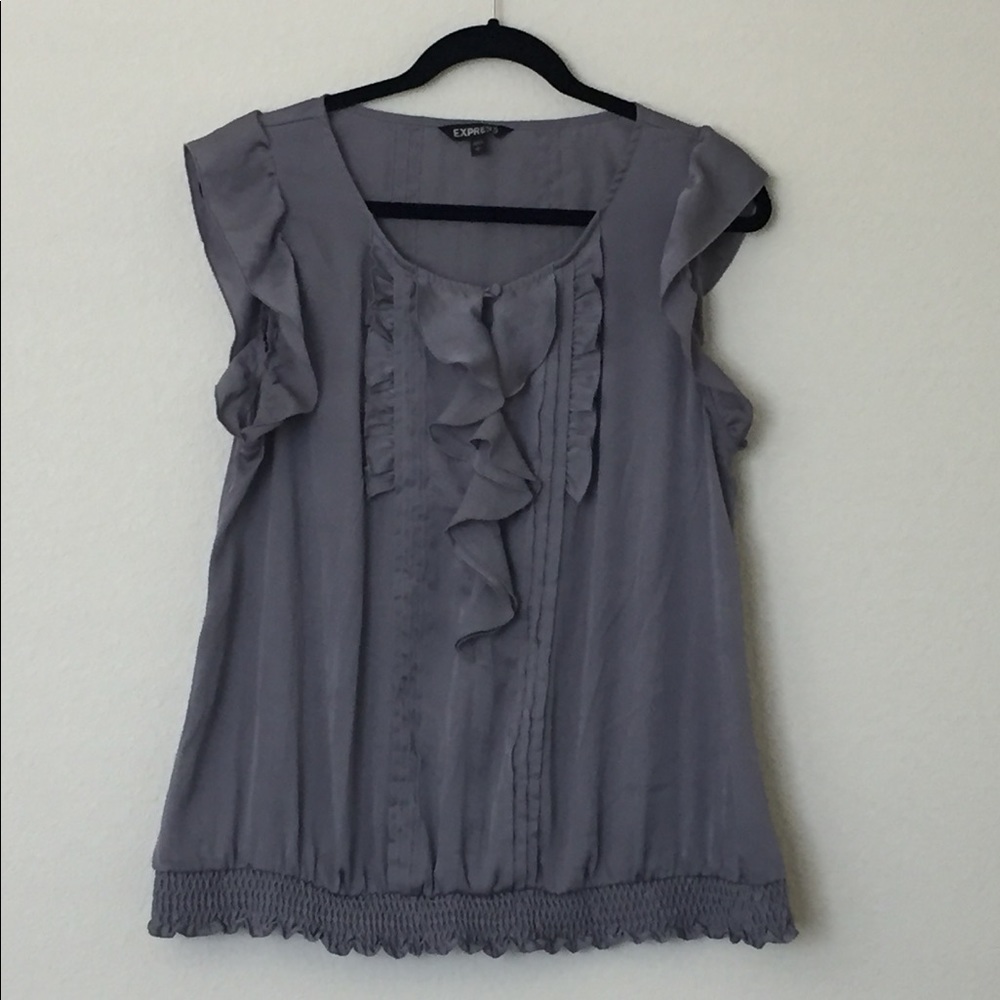 Ruffled sleeveless blouse