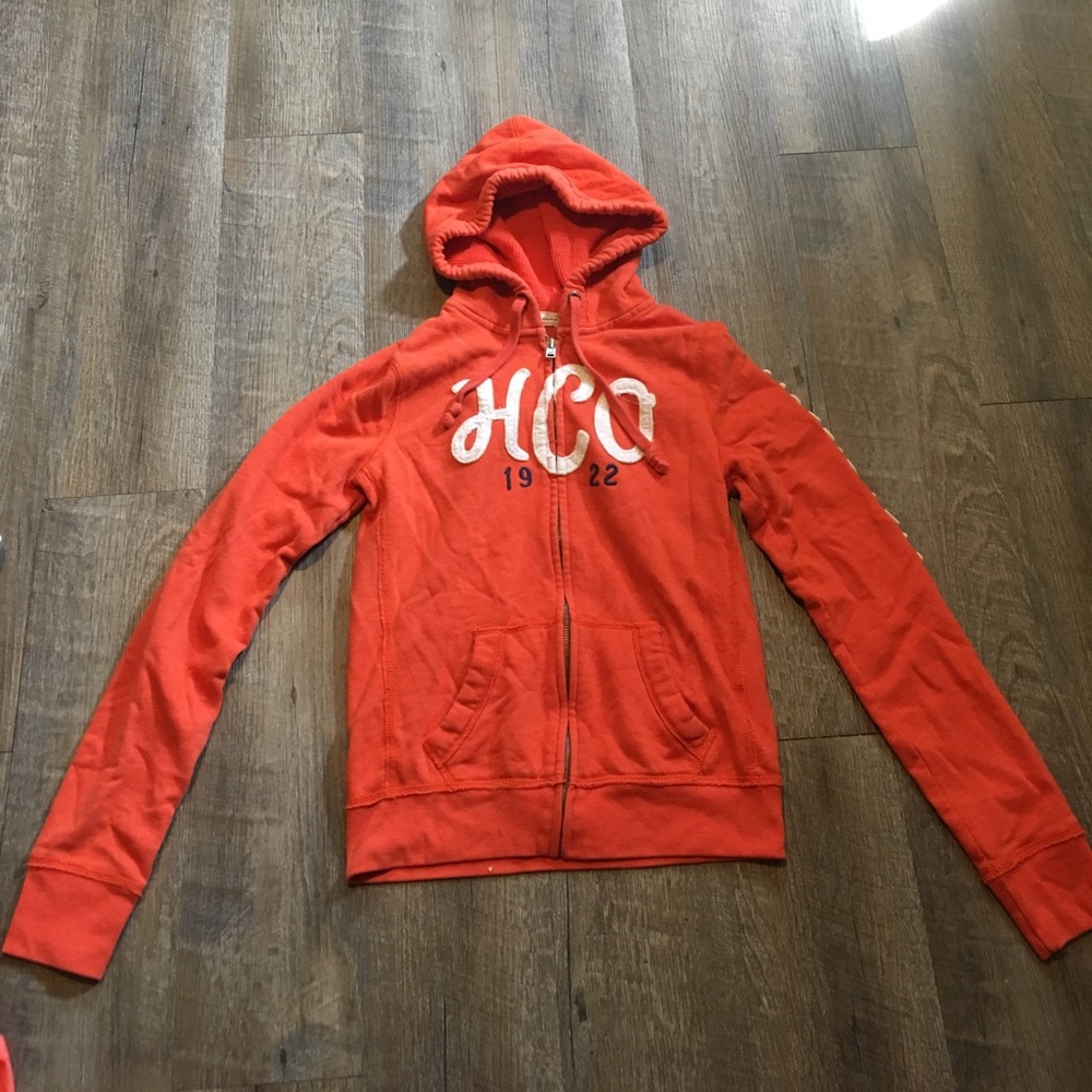 Orange Hollister zip up hoodie