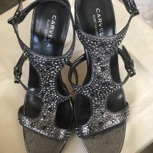 Pewter colored with stud details.