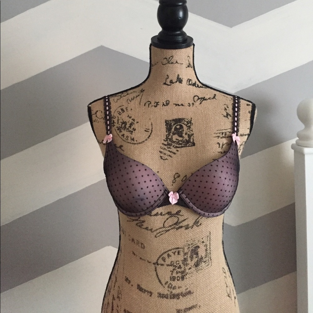 Laced black and baby pink bra