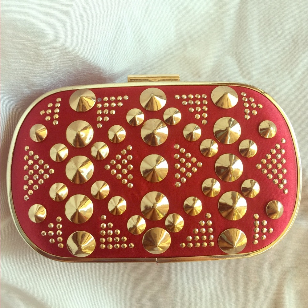 Burgundy red and gold studded clutch