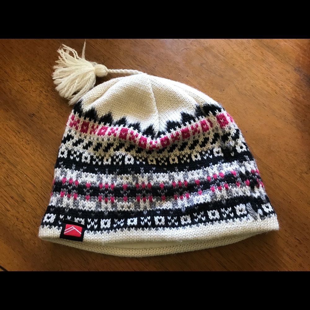 Striped white, black, and pink beanie