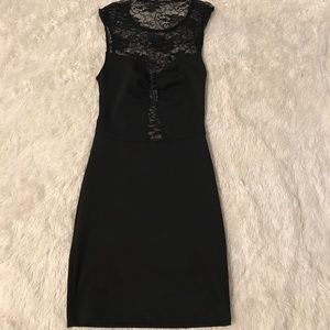 Mini black dress with lace front and back