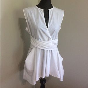White v-neck blouse with pleated waist