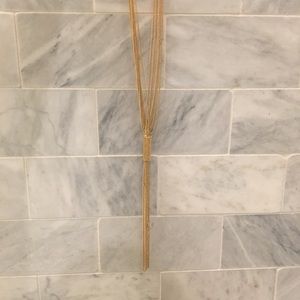 Gold tassel necklace