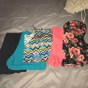 3 pairs of shorts and 2 tops