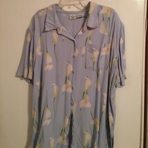 Flora print blouse is light bluish w/calla lilies