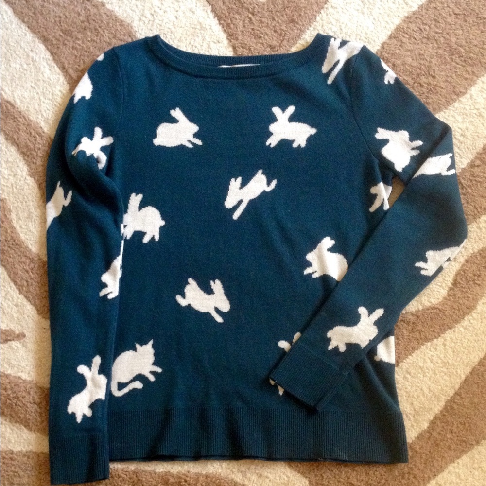Green sweater with bunny/cat silhouettes