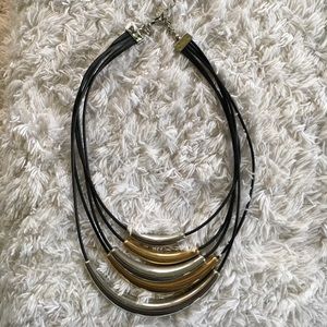 Gold/silver, leather cord necklace by Kiom Family
