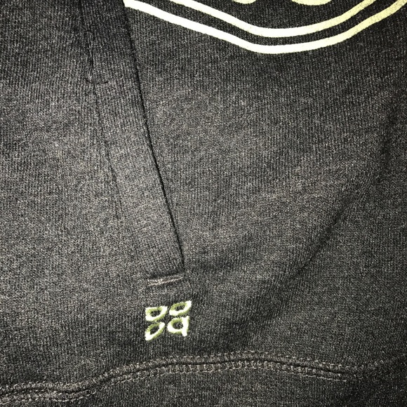 grey and lime green hoodie
