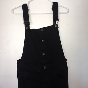 Black ripped overalls
