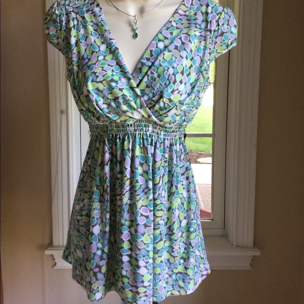 Stretchy printed surplice top w/padded bust