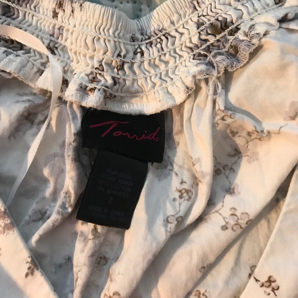 Two torrid tops. I can sell separate too