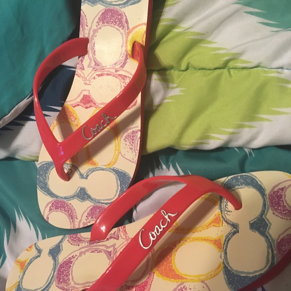 Coach rubber Cassie flip flops in size 5B.