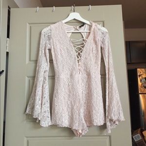 Pale pink lace romper