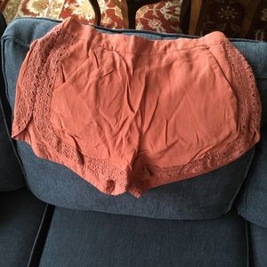 Anthropologie rust colored shorts