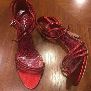Gorgeous strappy red high heels.