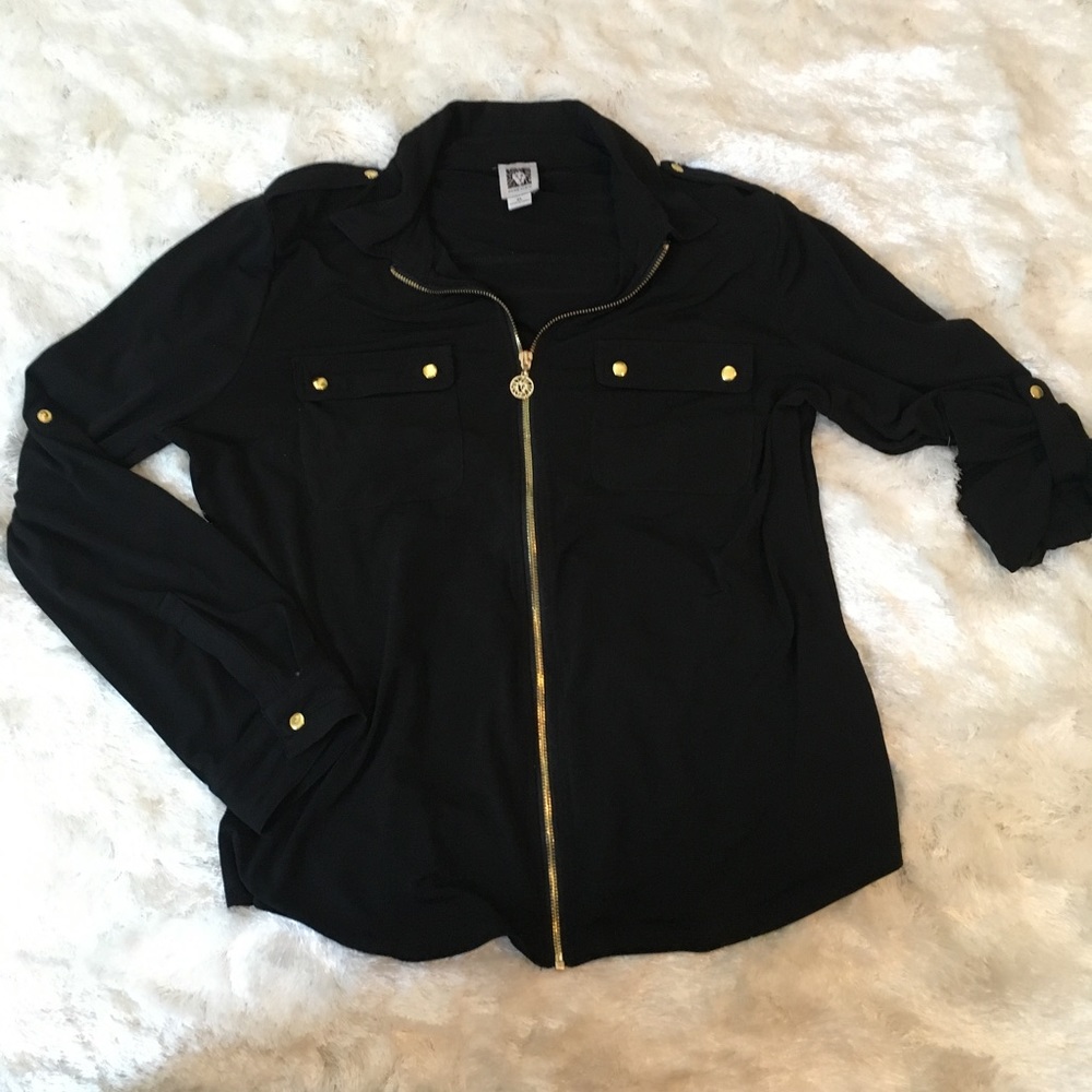 Black top with gold accents