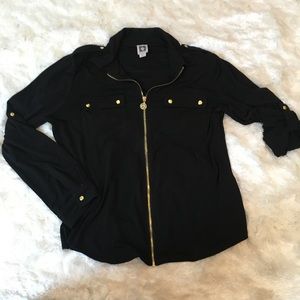 Black top with gold accents