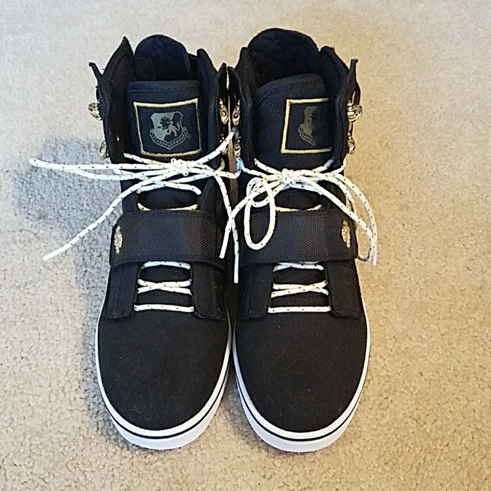 Black and gold vlado sneakers