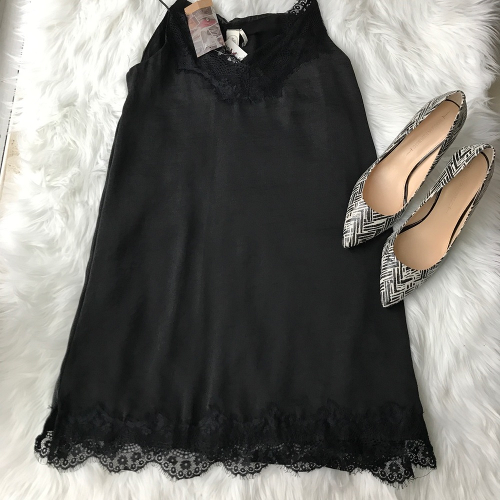 New with tags paper crane lace detail black dress