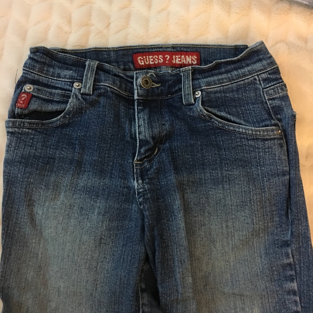 Form fitting boot cut Guess jeans.