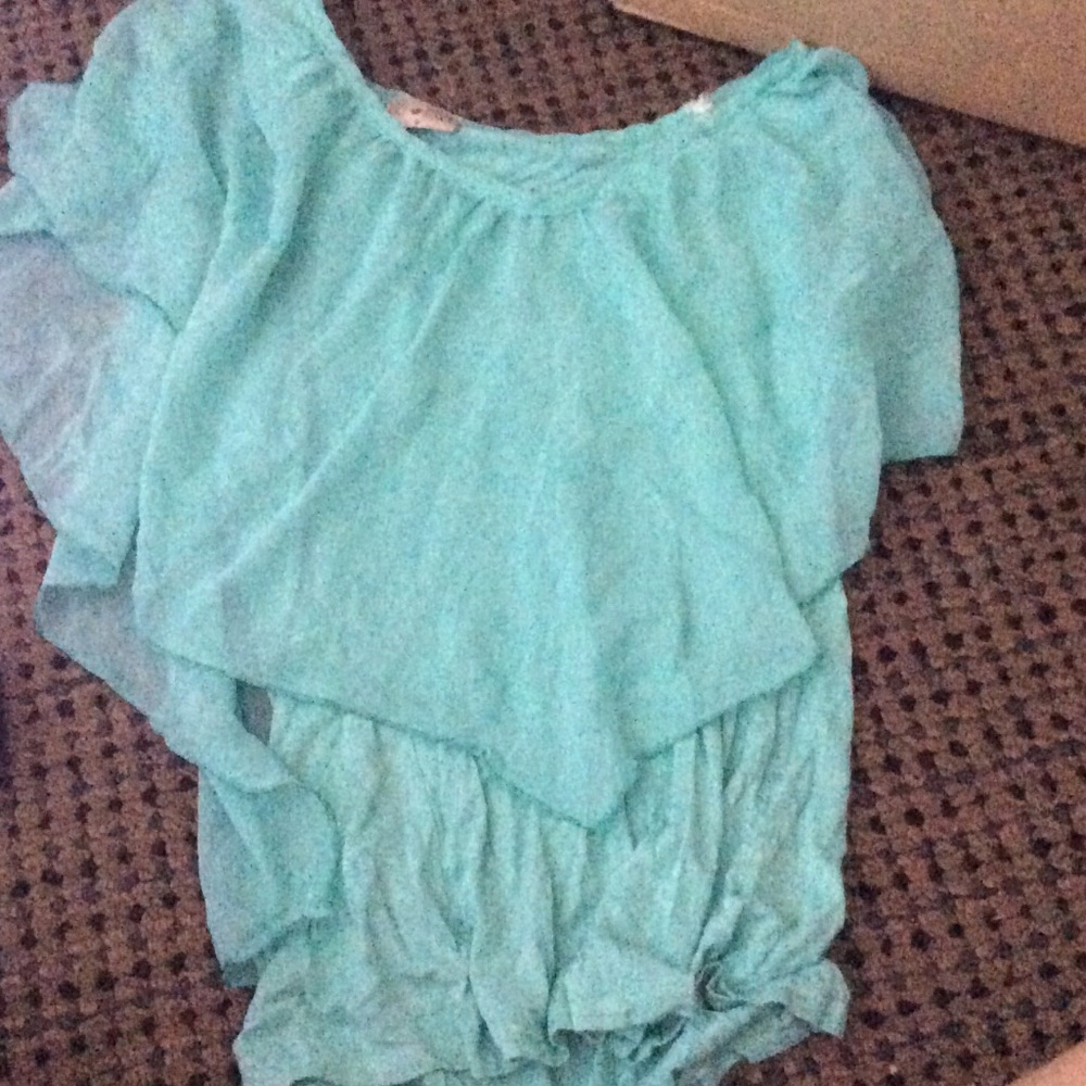 Blue ruffle sleeveless top