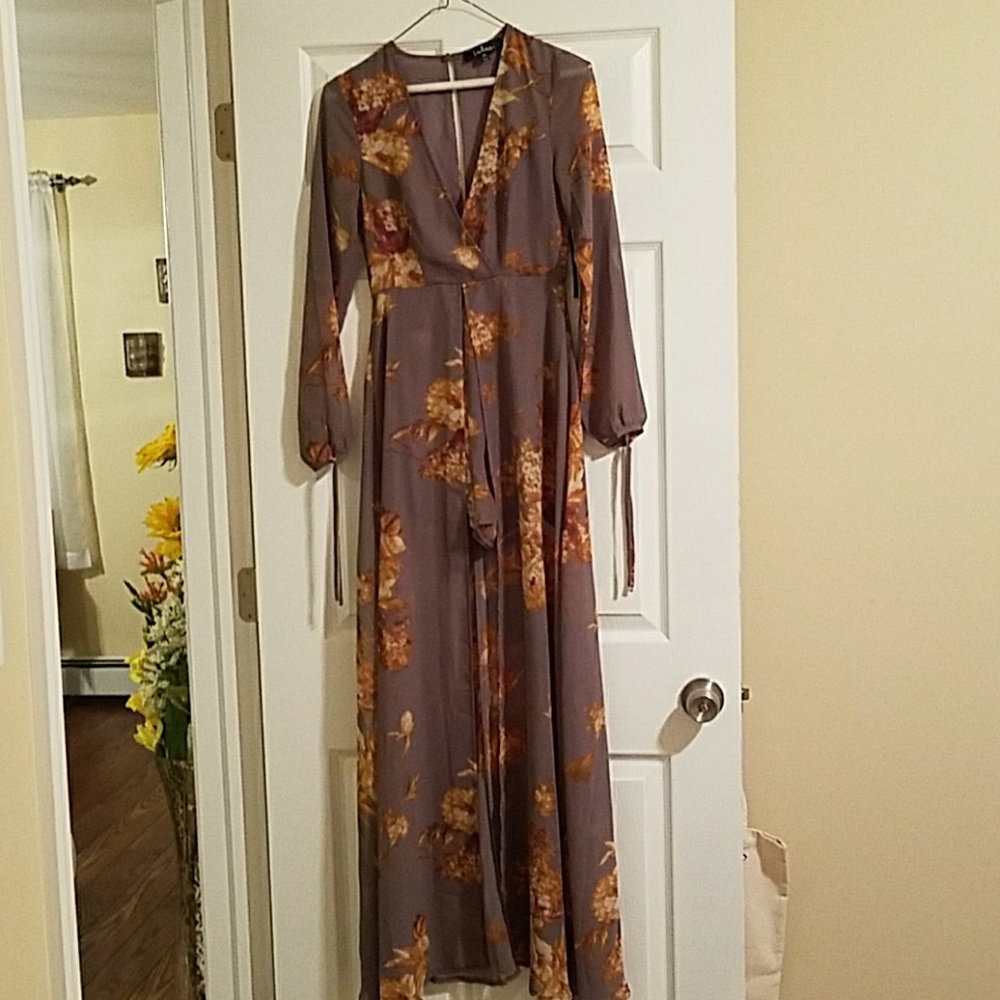 Romper- tags still on! Never worn.