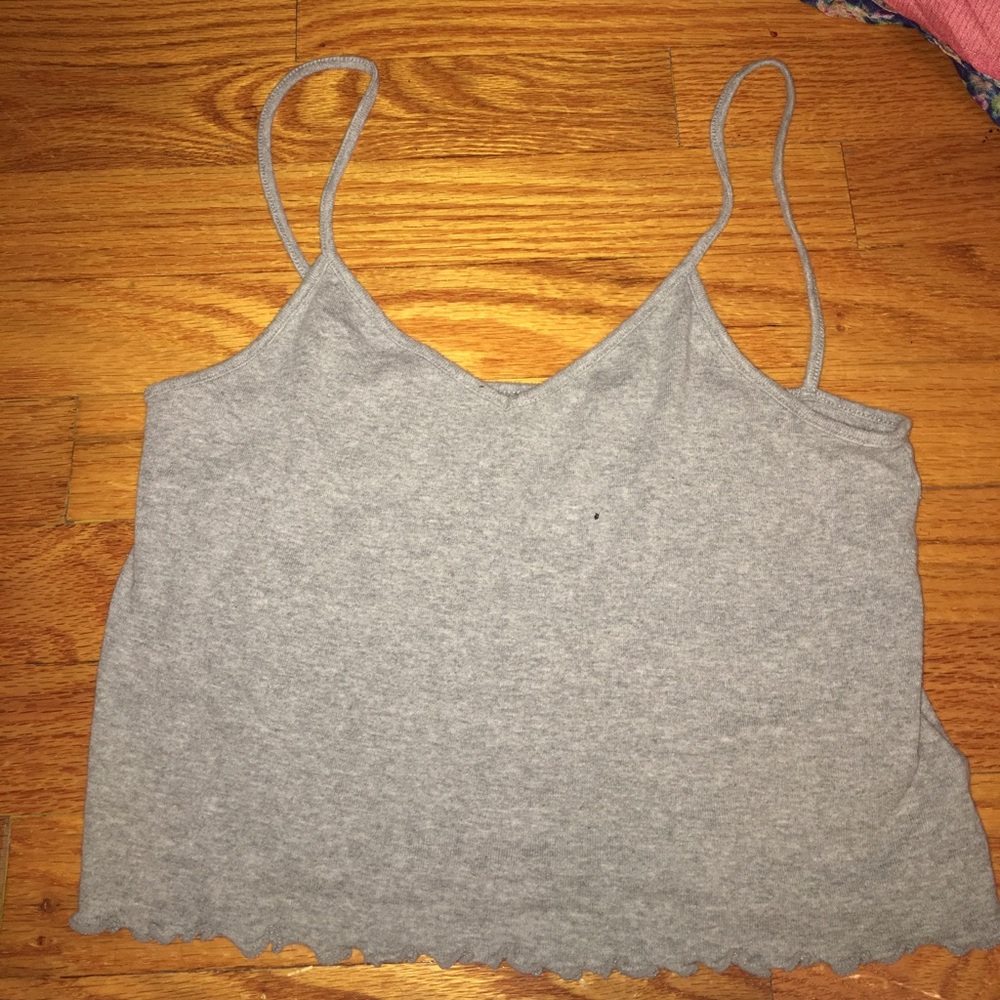 Grey ruffled tang/crop top.