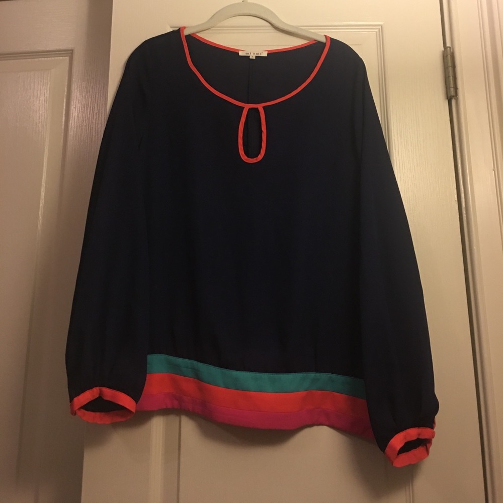 Navy blouse with fun pops of color on waist