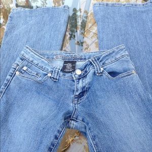 NWOT: Wet Seal Size 1/2 Long Jeans.