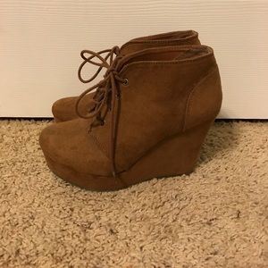 Wedge booties in brown suede