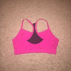 Pink and black sports bra
