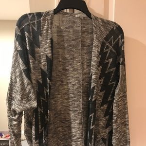 Two worn once black leggings and cardigan