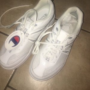 Brand new white champion gym shoes. Size 8