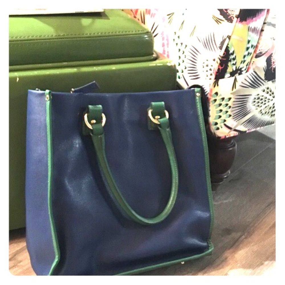 Varielle italian leather in navy with green trim.