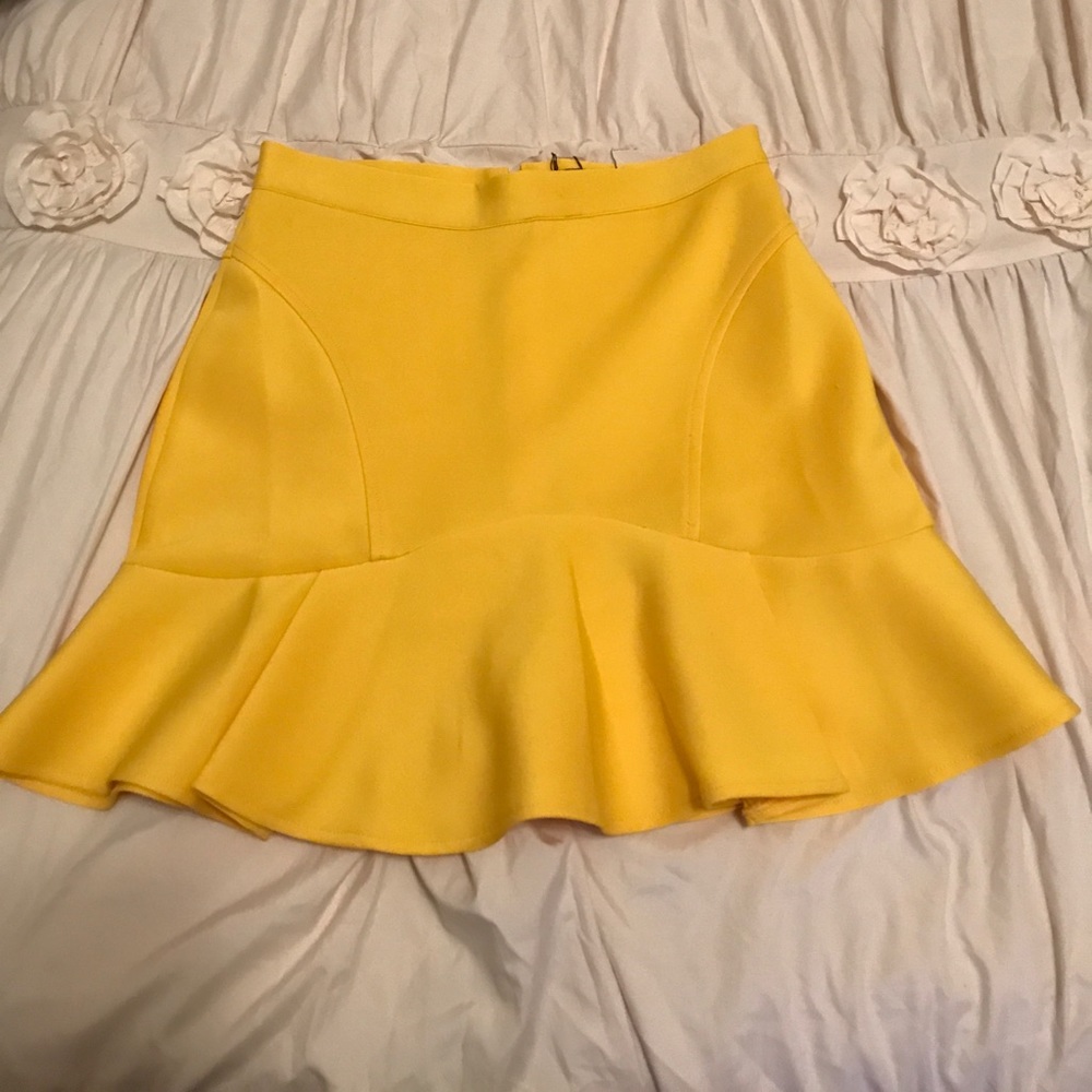 Yellow peplum mini skirt