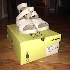 FLY London off white wedges.