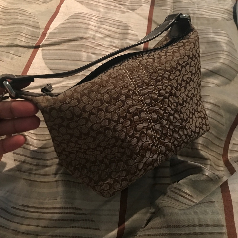 Tiny coach purse