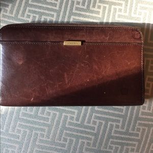 Vintage Coach brown leather wrap around wallet.
