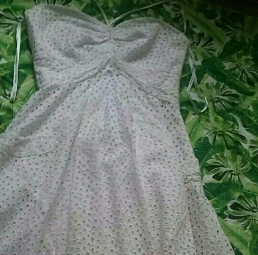 A white Calvin Klein dress.