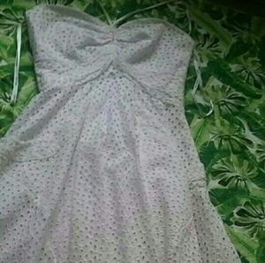 A white Calvin Klein dress.