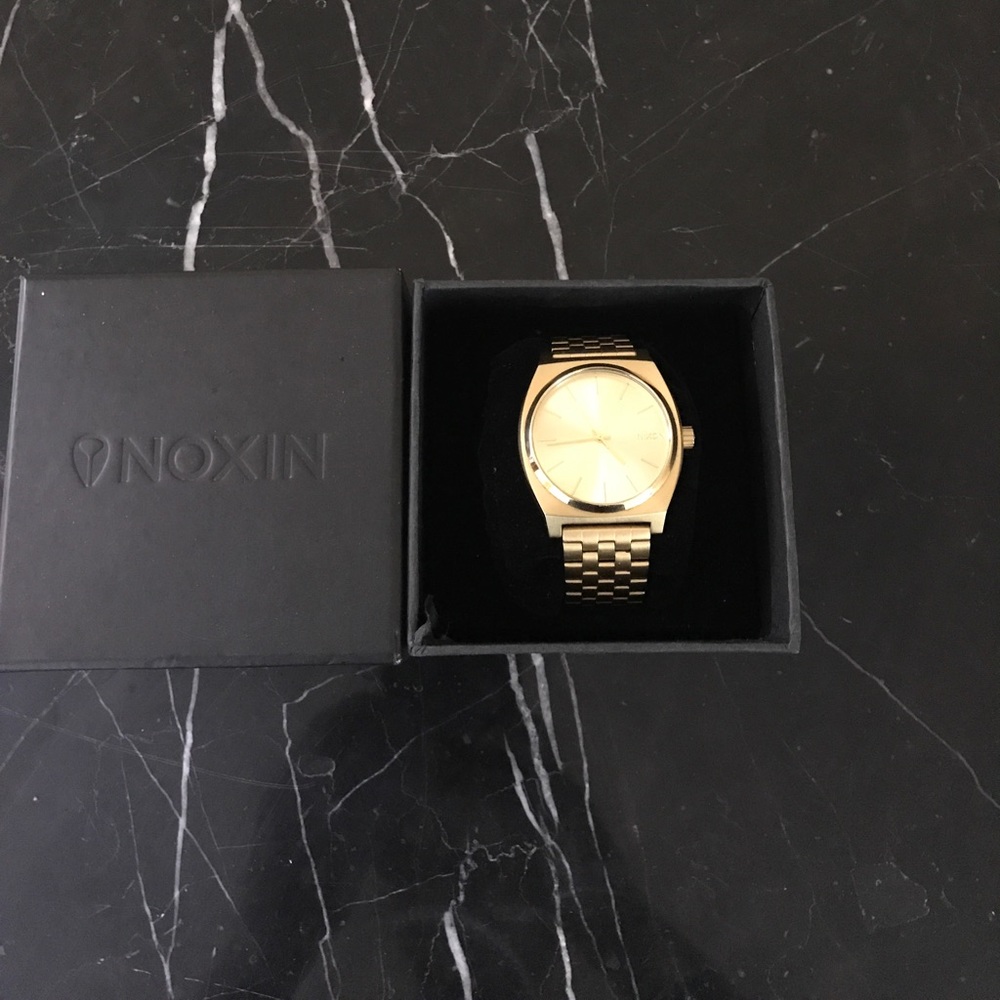 Gold / Nixon watch / Time Teller