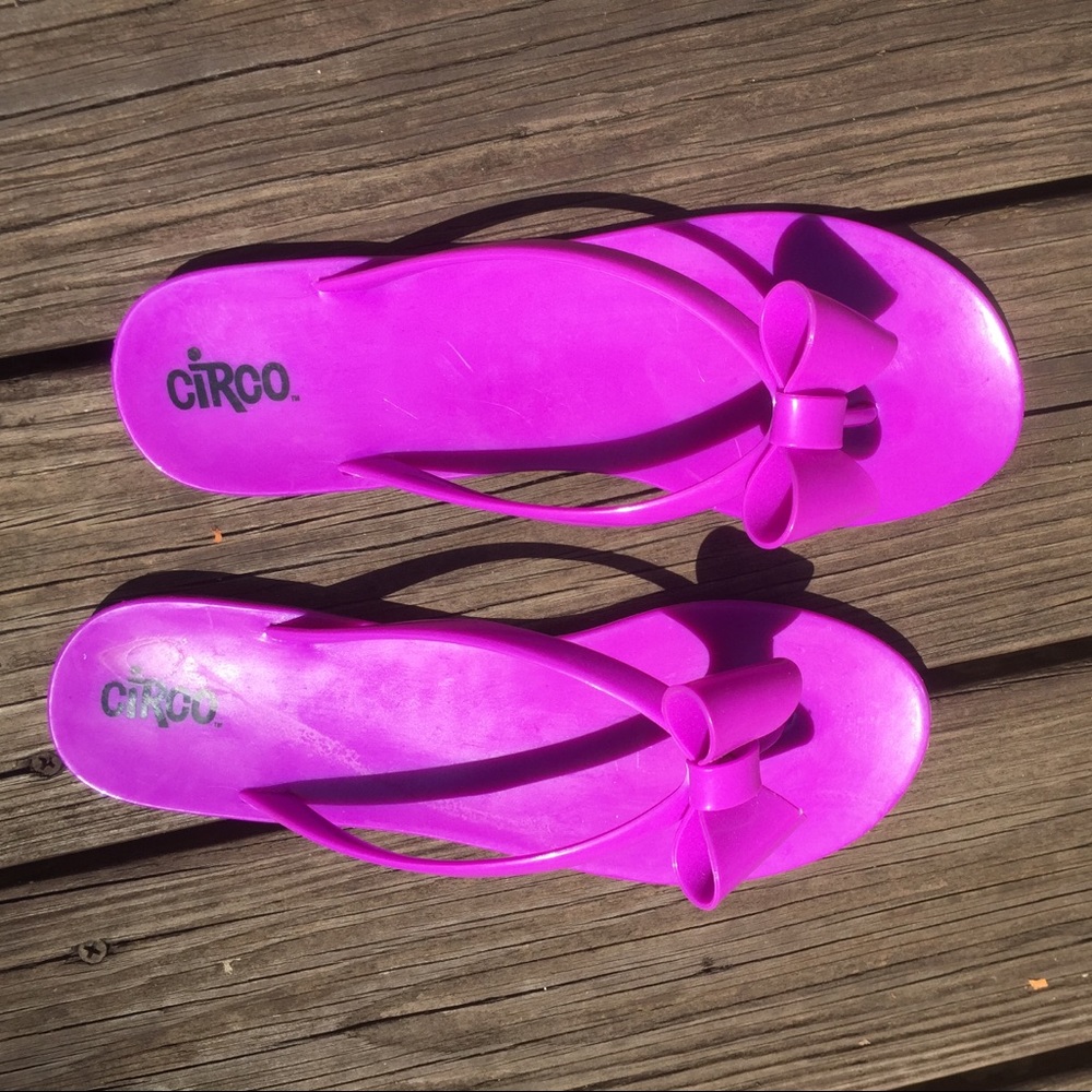 Bright purple flip flops