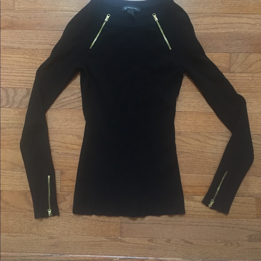 Black sweater with gold zippers