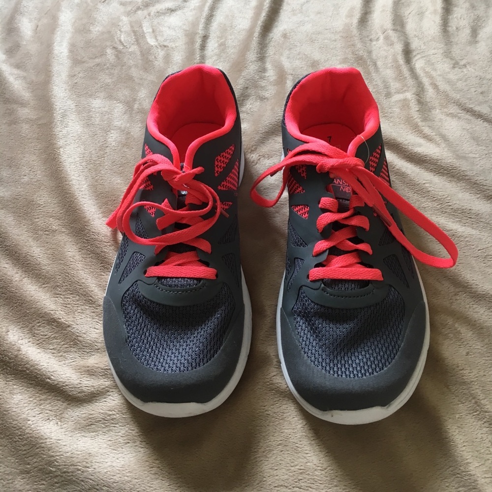 Gray and pink tennis shoes